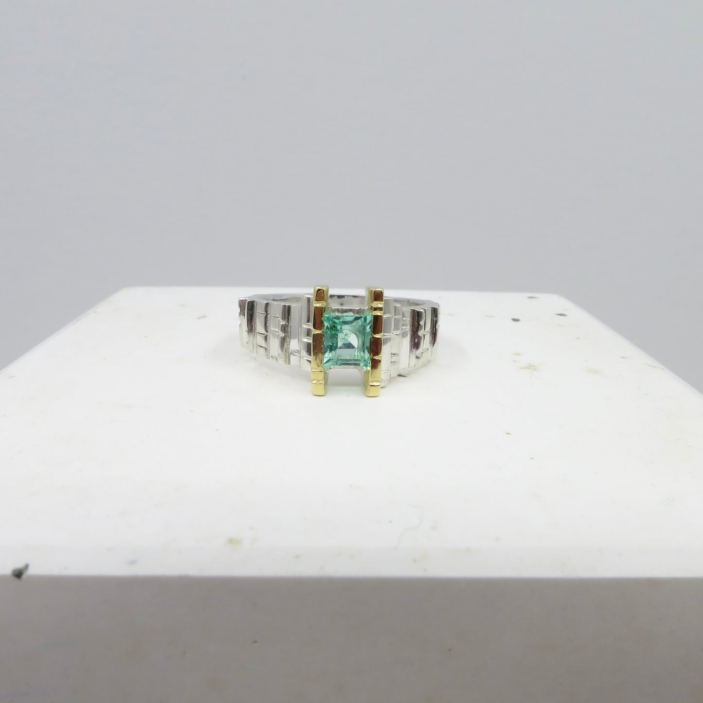 Causeway Column ring with square cut emerald